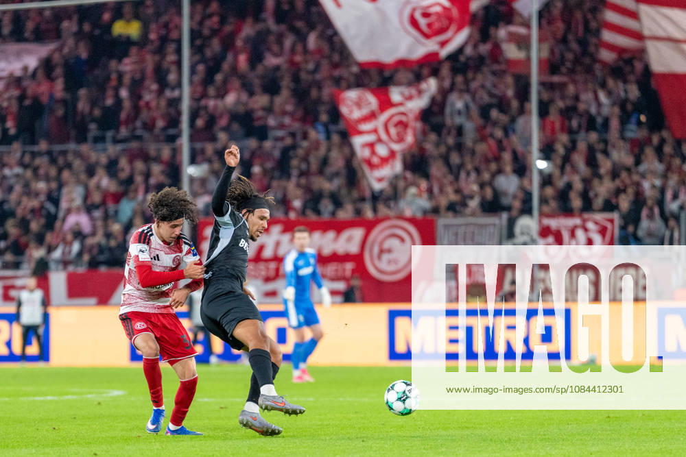 Anas Slimani of Fortuna Düsseldorf, 34, in a tackle with Joshua Eze of SC Verl, 06, as his jersey is pulled—Fortuna Düsseldorf vs. SC Verl, soccer, 3rd Division, Matchday 8, 2026–27 season, December 10, 2026, DFL regulations prohibit any use of photographs as image sequences and or quasi-video. Fortuna Düsseldorf vs. SC Verl, soccer, 3rd Division, Matchday 8, 2026–27 season, October 12, 2026, Düsseldorf