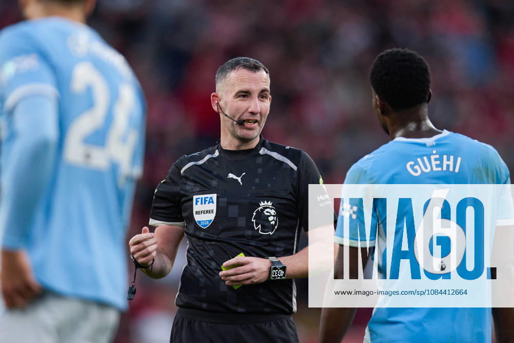 The Referee Chris Kavanagh (L) argues with Marc Guehi of Manchester City (R) during the Premier League 2026 27 football match between Liverpool FC and Manchester City at Anfield on October 11, 2026 in Liverpool, England. (Photo by Koby Abbott Sports Press Photo)