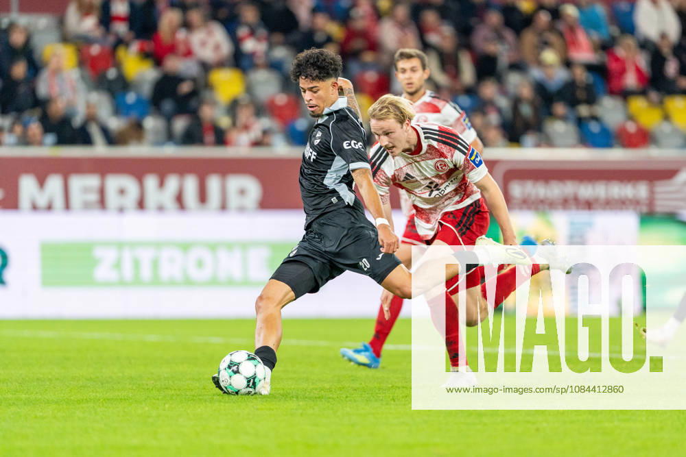 Lukas Bornschein, Fortuna Düsseldorf, No. 04 in a tackle with Andre Leipold of SC Verl, No. 20 preparing to take a shot, Fortuna Düsseldorf vs. SC Verl, Soccer, 3rd Division, Matchday 8, 2026–27 Season, December 10, 2026, DFL regulations prohibit any use of photographs as image sequences and or quasi-video, Fortuna Düsseldorf vs. SC Verl, soccer, 3rd Division, Matchday 8, 2026–27 season, October 12, 2026, Düsseldorf