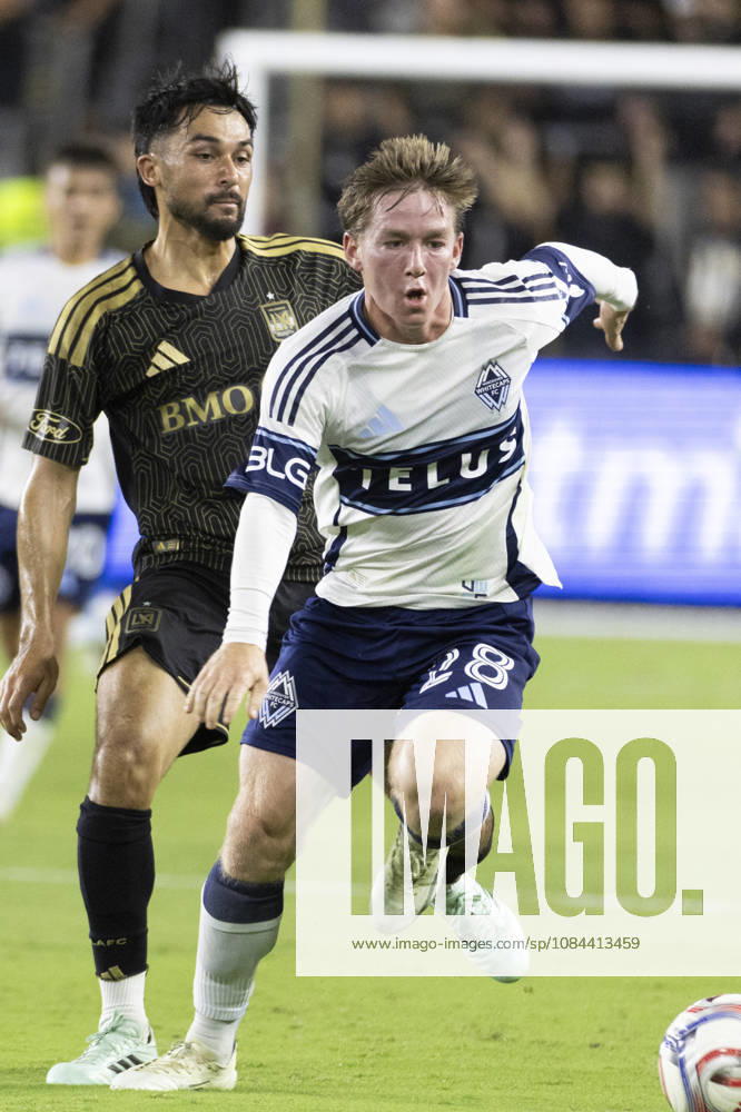 Vancouver Whitecaps left wing back Tate Johnson (28) and Los Angeles FC defensive midfielder Mathieu Choiniere (66) in actions during a MLS, Fussball Herren, USA soccer game on Saturday, Oct. 10, 2026 in Los Angeles. Los Angeles USA - ZUMAc68_ 20261010_zaf_c68_088