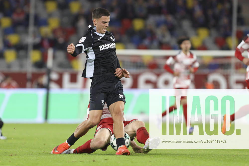 Almin Mesanovic of SC Verl and Lukas Bornschein of Fortuna Düsseldorf battle for the ball during the 3. Liga match between Fortuna Düsseldorf and SC Verl at the Merkur Spiel Arena on October 11, 2026, in Düsseldorf, Germany. Photo by Oliver Kaelke, DeFodi Images. Almin Mesanovic of SC Verl and Lukas Bornschein of Fortuna Düsseldorf battle for the ball during the 3. Liga match between Fortuna Düsseldorf and SC Verl at Merkur Spiel Arena on October 11, 2026 in Düsseldorf, Germany. Photo by Oliver Kaelke, DeFodi Images. DFB and DFL regulations prohibit any use of photographs as image sequences and or quasi-video. Photo by Oliver Kaelke, DeFodi Images.