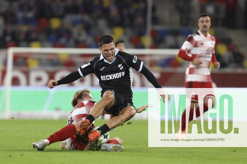 Almin Mesanovic of SC Verl and Lukas Bornschein of Fortuna Düsseldorf battle for the ball during the 3. Liga match between Fortuna Düsseldorf and SC Verl at the Merkur Spiel Arena on October 11, 2026, in Düsseldorf, Germany. Photo by Oliver Kaelke, DeFodi Images. Almin Mesanovic of SC Verl and Lukas Bornschein of Fortuna Düsseldorf battle for the ball during the 3. Liga match between Fortuna Düsseldorf and SC Verl at Merkur Spiel Arena on October 11, 2026 in Düsseldorf, Germany. Photo by Oliver Kaelke, DeFodi Images. DFB and DFL regulations prohibit any use of photographs as image sequences and or quasi-video. Photo by Oliver Kaelke, DeFodi Images.