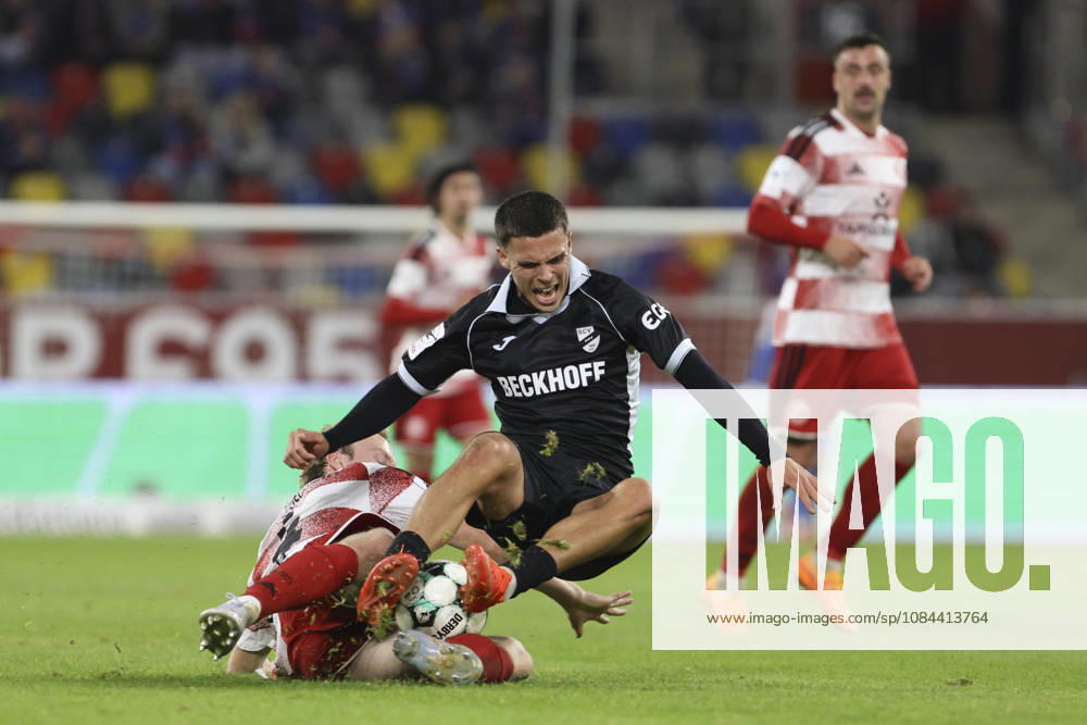 Almin Mesanovic of SC Verl and Lukas Bornschein of Fortuna Düsseldorf battle for the ball during the 3. Liga match between Fortuna Düsseldorf and SC Verl at the Merkur Spiel Arena on October 11, 2026, in Düsseldorf, Germany. Photo by Oliver Kaelke, DeFodi Images. Almin Mesanovic of SC Verl and Lukas Bornschein of Fortuna Düsseldorf battle for the ball during the 3. Liga match between Fortuna Düsseldorf and SC Verl at Merkur Spiel Arena on October 11, 2026 in Düsseldorf, Germany. Photo by Oliver Kaelke, DeFodi Images. DFB and DFL regulations prohibit any use of photographs as image sequences and or quasi-video. Photo by Oliver Kaelke, DeFodi Images.
