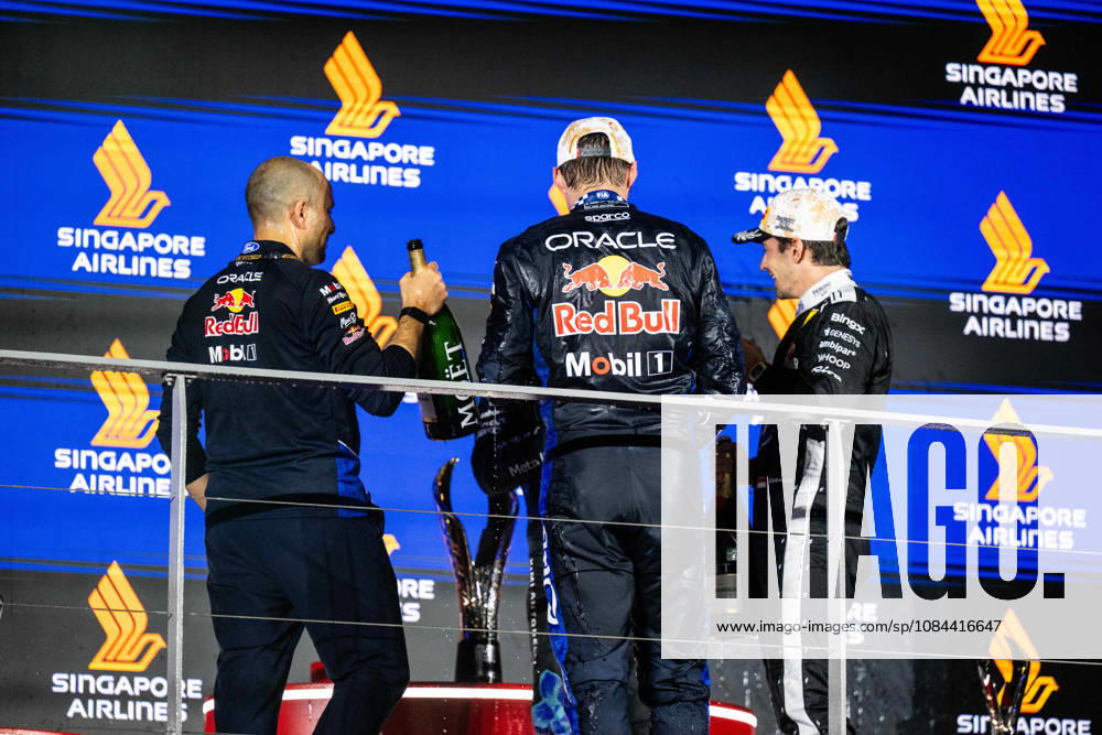 F1 - SINGAPORE GRAND PRIX 2026 LAMBIASE Gianpiero, Head of Race Engineering at Red Bull Racing, portrait, VERSTAPPEN Max (nld), Red Bull Racing Ford RB22, portrait podium during the 2026 Formula 1 Singapore Grand Prix, 17th round of the 2026 Formula One World Championship, WM, Weltmeisterschaft from October 9 to 11, 2026 on the Marina Bay Street Circuit, in Singapore, Singapore - SingaporeSingapore