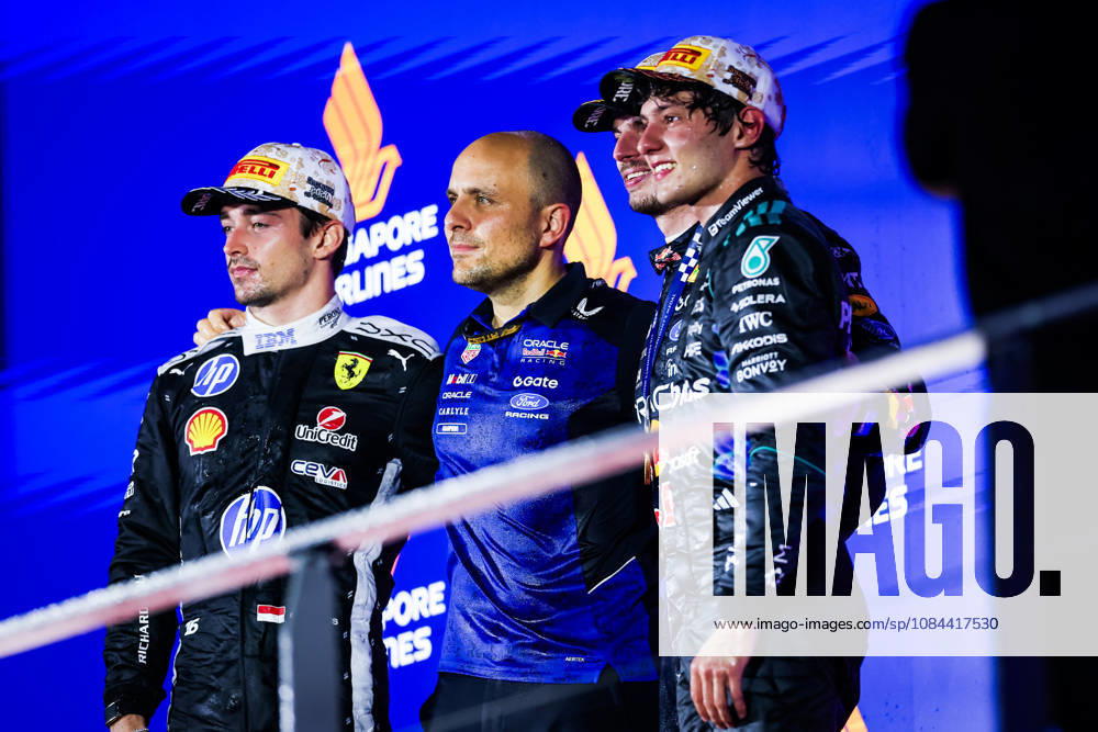 F1 - SINGAPORE GRAND PRIX 2026 LAMBIASE Gianpiero, Head of Race Engineering at Red Bull Racing, KIMI ANTONELLI Andrea (ita), Mercedes AMG F1 Team W17, LECLERC Charles (mco), Scuderia Ferrari SF-26, portrait podium during the 2026 Formula 1 Singapore Grand Prix, 17th round of the 2026 Formula One World Championship, WM, Weltmeisterschaft from October 9 to 11, 2026 on the Marina Bay Street Circuit, in Singapore, Singapore - SingaporeSingapore
