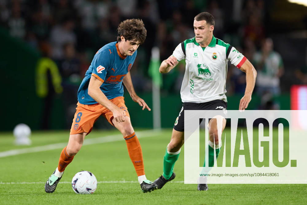 Javi Guerra of Valencia CF competes for the ball with Alvaro Mantilla of Real Racing Club de Santander during the LaLiga EA Sports match between Real Racing Club de Santander and Valencia CF at Campos de de El Sardinero on October 11, 2026, in Santander, Spain. Real Racing Club De Santander V Valencia CF - LaLiga EA Sports - ZUMAa181 20261011_zaa_a181_370