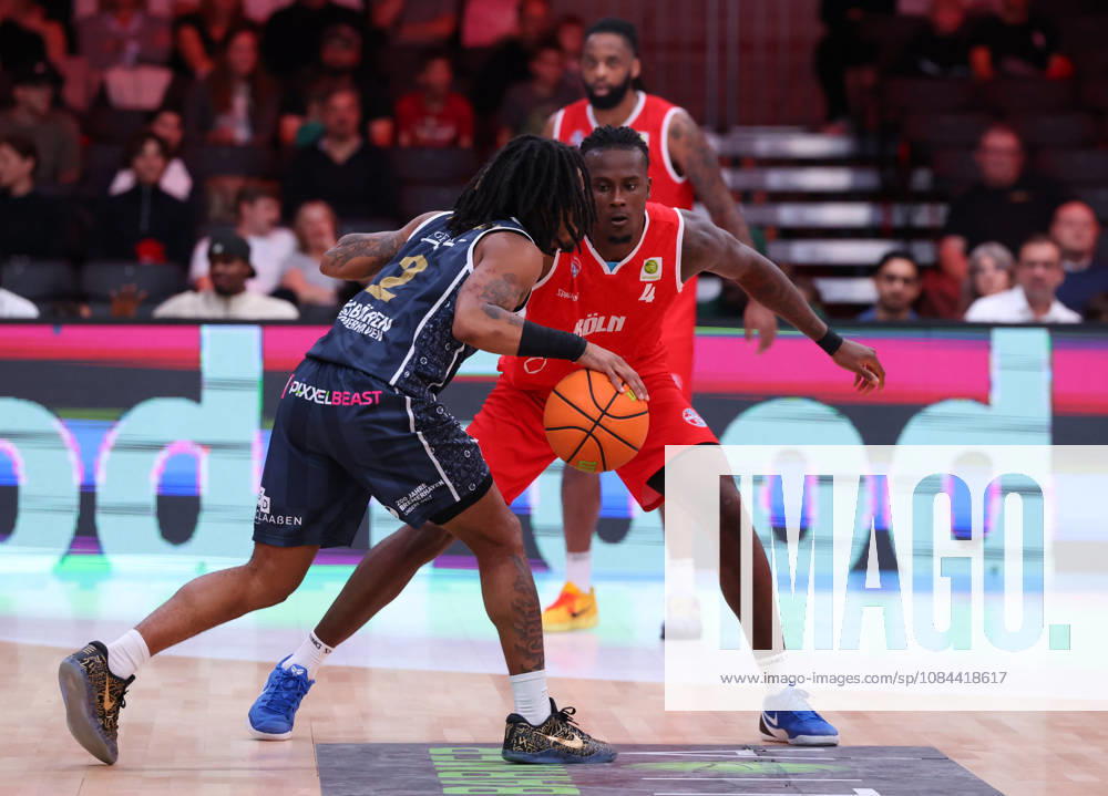 From left: Corey McKeithan, Eisbären Bremerhaven 02; James Patterson III, RheinStars Cologne 04; other RheinStars Cologne players in the background, GER; RheinStars Cologne vs. Eisbären Bremerhaven, basketball, ProA, Matchday 4, 2026–2027 season, October 11, 2026 GER, RheinStars Cologne vs. Eisbären Bremerhaven, basketball, ProA, Matchday 4, 2026–2027 season, October 11, 2026 RheinStars Cologne