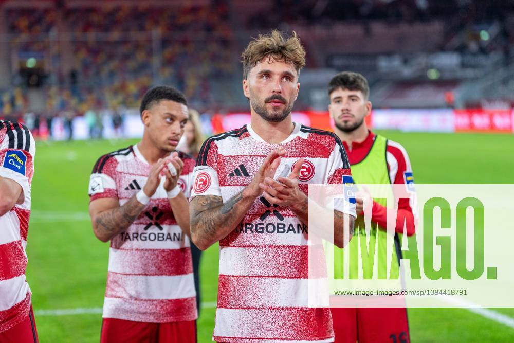 Steven van der Sloot (Fortuna Düsseldorf, No. 02), Filimon Gerezhiher (Fortuna Düsseldorf, No. 23), and Fabian Schleusener (Fortuna Düsseldorf, No. 24) high-five each other in front of the stands after the game between Fortuna Düsseldorf and SC Verl, soccer, 3. Liga, Matchday 8, 2026–27 season, October 12, 2026, DFL regulations prohibit any use of photographs as image sequences and or quasi-video. Fortuna Düsseldorf vs. SC Verl, soccer, 3. Liga, Matchday 8, 2026–27 season, October 12, 2026, Düsseldorf