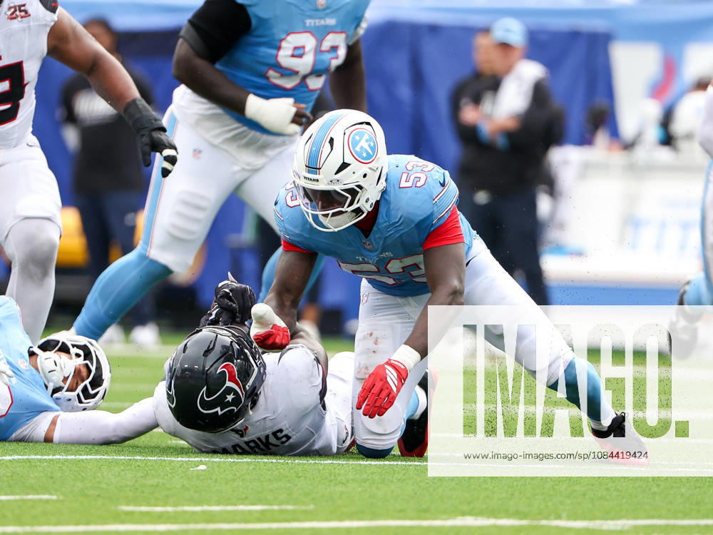 Oct 11, 2026; Nashville, TN, USA; Tennessee Titans linebacker Anthony Hill Jr. (53) tackles Houston Texans running back Woody Marks (4) during the NFL, American Football Herren, USA regular season game between the Houston Texans and Tennessee Titans at Nissan Stadium. Mandatory Credit: -Cal Media NFL 2026: Texans Vs Titans OCT 11 - ZUMAc04_ 20261011_zma_c04_077