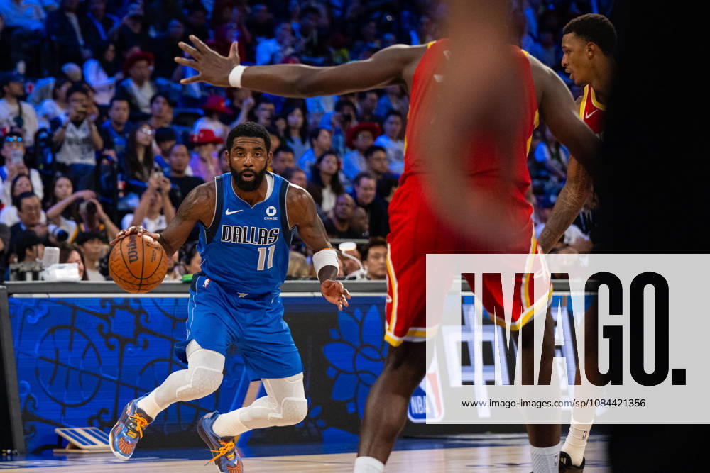 (261011) -- MACAO, Oct. 11, 2026 -- Kyrie Irving (L) of Dallas Mavericks dribbles during the 2026-2027 NBA, Basketball Herren, USA preseason game between Dallas Mavericks and Houston Rockets in Macao, south China, on Oct. 11, 2026. ) (SP)CHINA-MACAO-BASKETBALL-NBA PRESEASON-ROCKETS VS MAVERICKS (CN) CheongxKamxKa