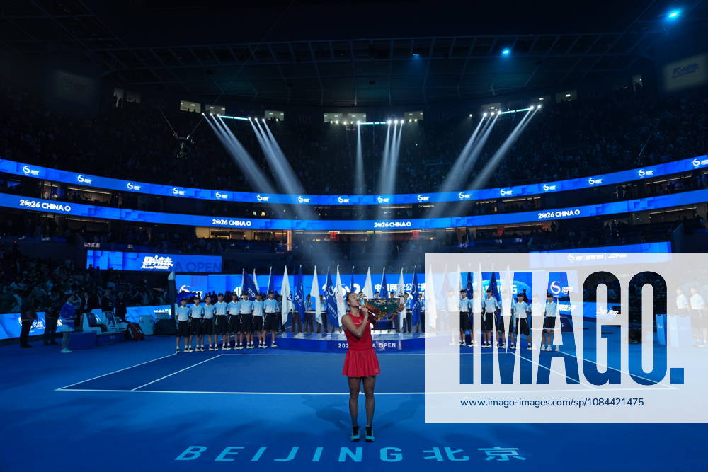 (261011) -- BEIJING, Oct. 11, 2026 -- Zheng Qinwen kisses the trophy during the awarding ceremony after the women s singles final between Zheng Qinwen of China and Mirra Andreeva of Russia at 2026 China Open tennis tournament in Beijing, China, Oct. 11, 2026. ) (SP)CHINA-BEIJING-TENNIS-CHINA OPEN-WOMEN S SINGLES-FINAL (CN) SunxFei