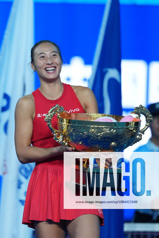 (261011) -- BEIJING, Oct. 11, 2026 -- Zheng Qinwen poses with the trophy during the awarding ceremony after the women s singles final between Zheng Qinwen of China and Mirra Andreeva of Russia at 2026 China Open tennis tournament in Beijing, China, Oct. 11, 2026. ) (SP)CHINA-BEIJING-TENNIS-CHINA OPEN-WOMEN S SINGLES-FINAL (CN) SunxFei
