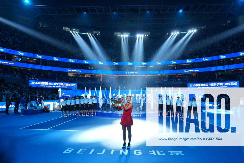 (261011) -- BEIJING, Oct. 11, 2026 -- Zheng Qinwen poses with the trophy during the awarding ceremony after the women s singles final between Zheng Qinwen of China and Mirra Andreeva of Russia at 2026 China Open tennis tournament in Beijing, China, Oct. 11, 2026. ) (SP)CHINA-BEIJING-TENNIS-CHINA OPEN-WOMEN S SINGLES-FINAL (CN) SunxFei