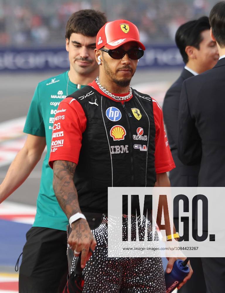 Formula 1 - Singapore Grand Prix SINGAPORE, REPUBLIC OF SINGAPORE, OCTOBER 11: Sir Lewis Hamilton racing driver for Ferrari from Great Britain during FIA Formula 1 Grand Prix of Singapore at Marina Bay Street Circuit, Singapore, Republic of Singapore on October 11. (Photo by Crystal Pix) Singapore Marina Bay Street Circuit Singapore