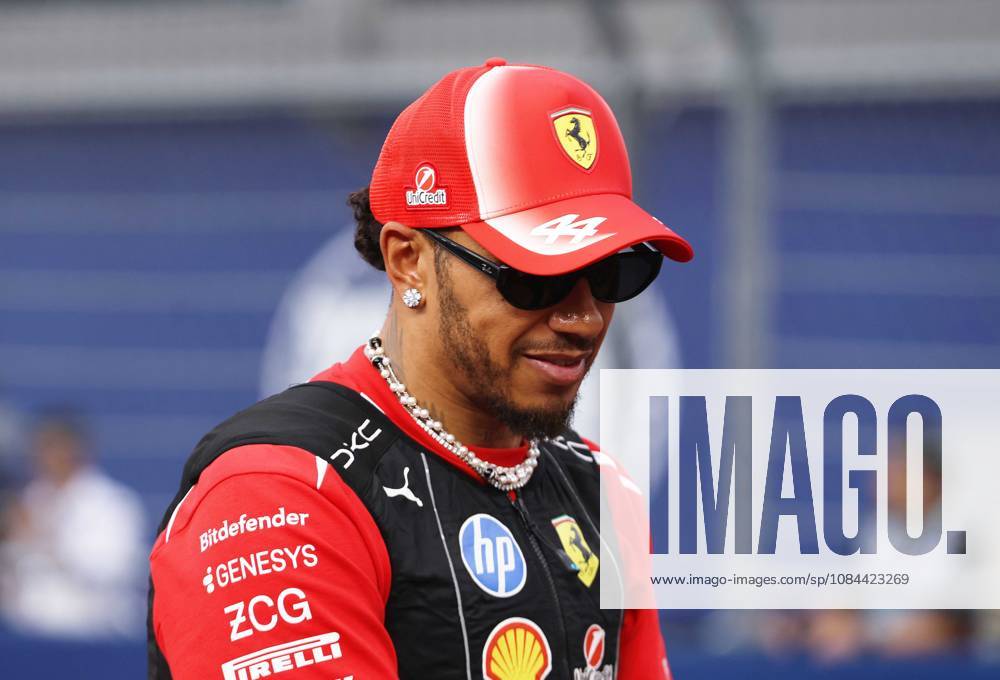 Formula 1 - Singapore Grand Prix SINGAPORE, REPUBLIC OF SINGAPORE, OCTOBER 11: Sir Lewis Hamilton racing driver for Ferrari from Great Britain during FIA Formula 1 Grand Prix of Singapore at Marina Bay Street Circuit, Singapore, Republic of Singapore on October 11. (Photo by Crystal Pix) Singapore Marina Bay Street Circuit Singapore