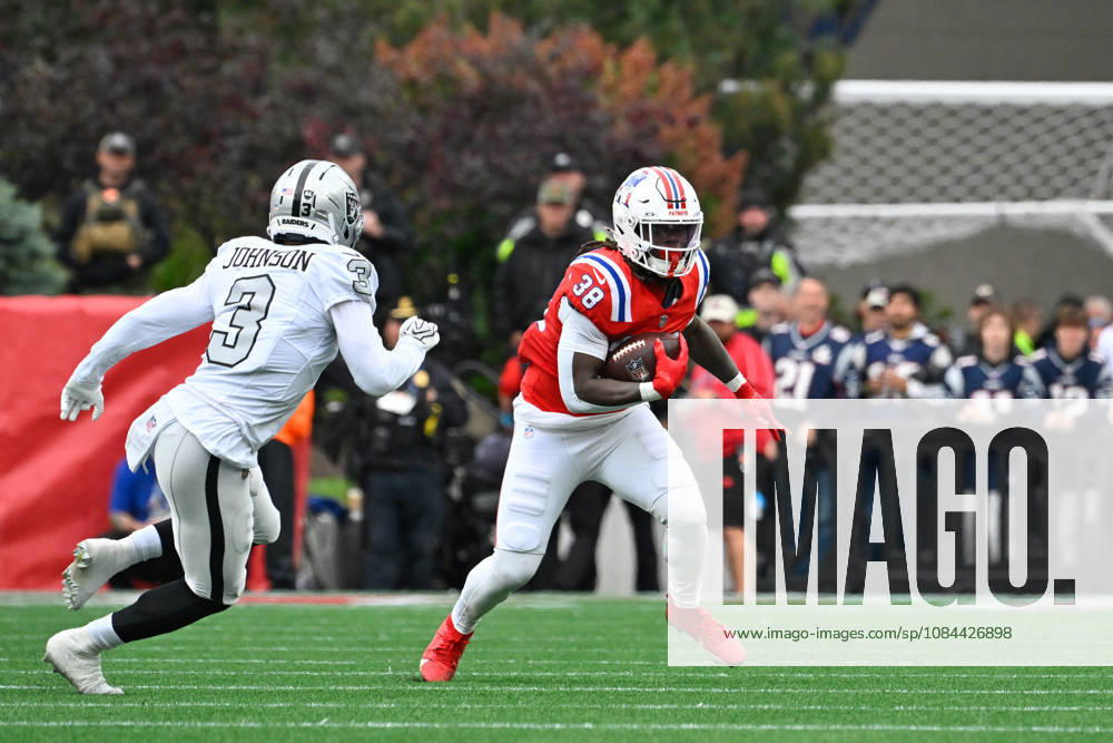 Oct 11, 2026; Foxborough, MA, USA; New England Patriots running back Rhamondre Stevenson (38) runs the ball against Las Vegas Raiders cornerback Taron Johnson (3) during the first half at Gillette Stadium. Mandatory Credit: -Cal Media Foxborough USA - ZUMAc04_ 20261011_zma_c04_136