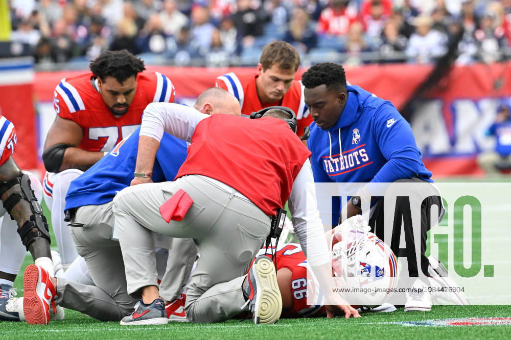 Oct 11, 2026; Foxborough, MA, USA; New England Patriots offensive tackle Will Campbell (66) is checked by training staff and head coach Mike Vrabel (red vest) during the first half against the Las Vegas Raiders at Gillette Stadium. Mandatory Credit: -Cal Media Foxborough USA - ZUMAc04_ 20261011_zma_c04_142