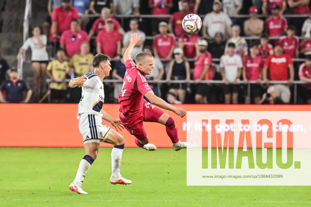 ST. LOUIS, MO - OCTOBER 11: Tomas Totland (14) of the St. Louis CITY SC gets sent flying through the air after being fouled by Harbor Miller (26) of the LA Galaxy during the MLS, Fussball Herren, USA regular season match where St. Louis CITY SC hosted LA Galaxy on Sunday October 11th, 2026, at Energizer Park in St. Louis City, MO. (Photo by Rick Ulreich Icon Sportswire) SOCCER: OCT 11 MLS St. Louis CITY SC vs LA Galaxy Icon26101135
