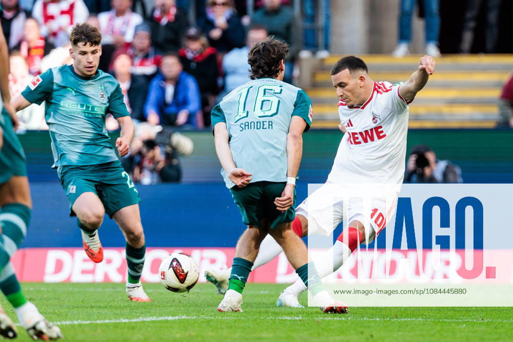 Said El Mala (1. FC Koeln, 10) shooting the ball against Philipp Sander (Borussia Moenchengladbach, 16) during the Bundesliga match between 1. FC Koeln vs. Borussia Moenchengladbach at Rheinenergie-Stadion on matchday 5 of the 1. Bundesliga on October 11, 2026 in Koeln, Germany. DFL REGULATIONS PROHIBIT ANY USE OF PHOTOGRAPHS AS IMAGE SEQUENCES AND OR QUASI-VIDEO. North Rhine Westphalia Germany
