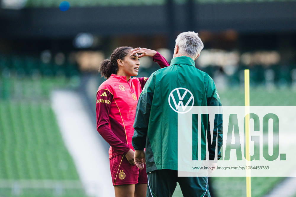 DFB Women s Final Training Session, October 12, 2026: Cora Zicai (Germany, age 19) speaks with Christian Wück, coach of the German women s national soccer team, during the final training session ahead of the Germany vs. Japan match on October 12, 2026, at the Weserstadion, Bremen. DFL regulations prohibit any use of photographs as image sequences and or quasi-video.