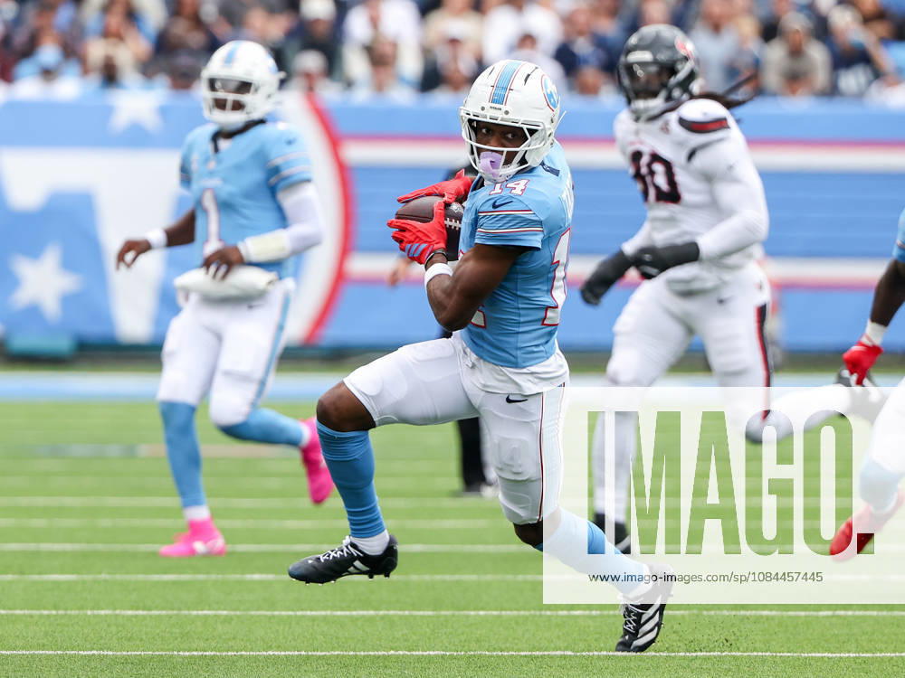 Oct 11, 2026; Nashville, TN, USA; Tennessee Titans wide receiver Carnell Tate (14) runs with the ball after making a reception during the NFL, American Football Herren, USA regular season game between the Houston Texans and Tennessee Titans at Nissan Stadium. Mandatory Credit: -Cal Media NFL 2026: Texans Vs Titans OCT 11 - ZUMAc04_ 20261011_zma_c04_339