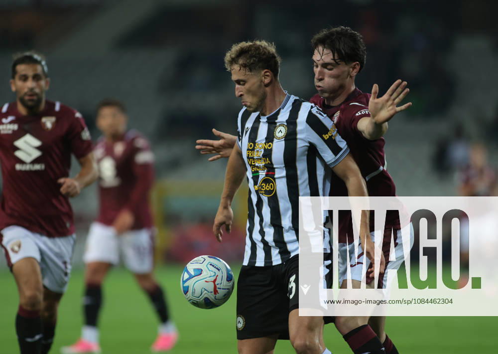 IPA89612580 - Mergim Vojvoda of Udinese Calcio and Alessio Cacciamani of Torino FC during the 2026–27 Italian Serie A season, in a soccer match between Torino FC and Udinese Calcio on October 12, 2026, at the Stadio Olimpico Grande Torino, Turin, Italy. Photo by Nderim Kaceli