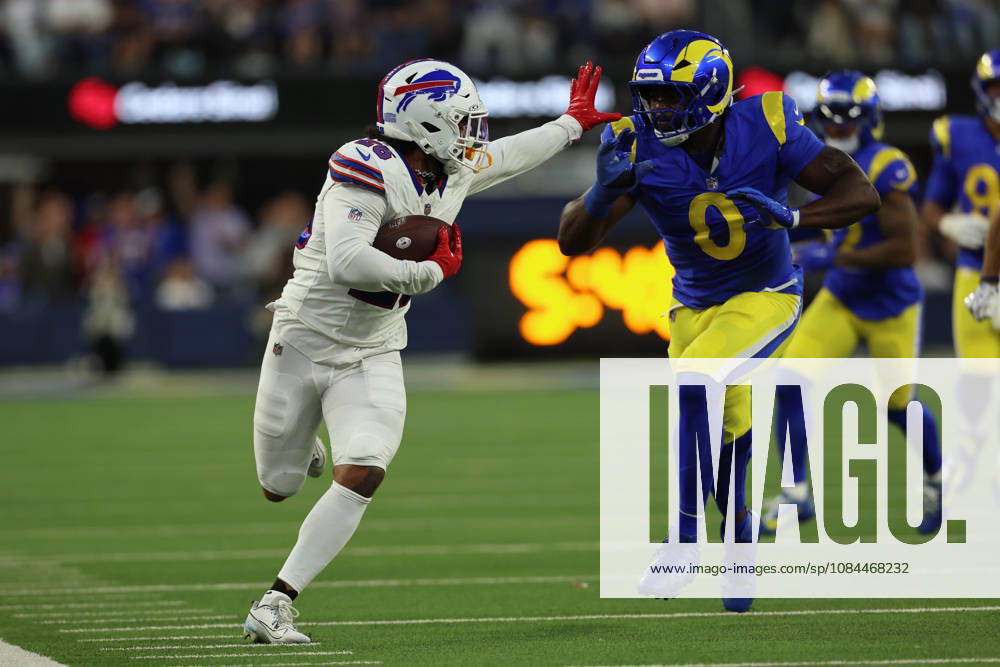 INGLEWOOD, CA - OCTOBER 12: Ty Johnson 26 of the Buffalo Bills carries the ball while chased by Byron Young 0 of the Los Angeles Rams during an NFL, American Football Herren, USA game between the Buffalo Bills and the Los Angeles Rams on October 12, 2026, at SoFi Stadium in Inglewood, California. (Photo by Greg Fiore Icon Sportswire) NFL: OCT 12 Bills at Rams Icon2610121888
