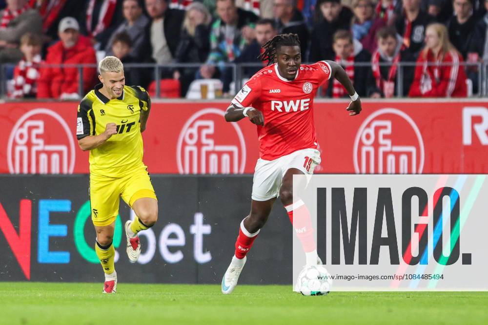 Soccer, 3rd Division, Matchday 9: Rot Weiss Essen vs. Fortuna Köln on October 13, 2026, at the Stadion an der Hafenstraße in Essen. Tom Geerkens (Köln, left) and Franci Bouebari (Essen, right). DFB regulations prohibit any use of photographs as image sequences and or quasi-video.