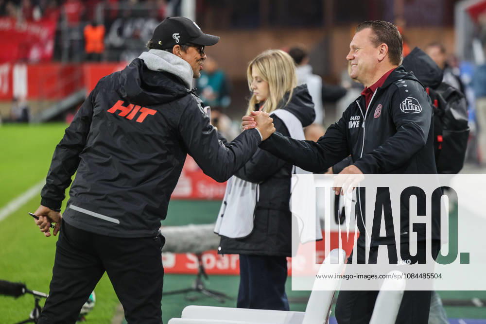 Soccer, 3rd Division, Matchday 9: Rot Weiss Essen vs. Fortuna Köln on October 13, 2026, at the Stadion an der Hafenstraße in Essen. Matthias Mink, head coach of Köln (left); Uwe Koschinat, head coach of Essen (right). DFB regulations prohibit any use of photographs as image sequences and or quasi-video.