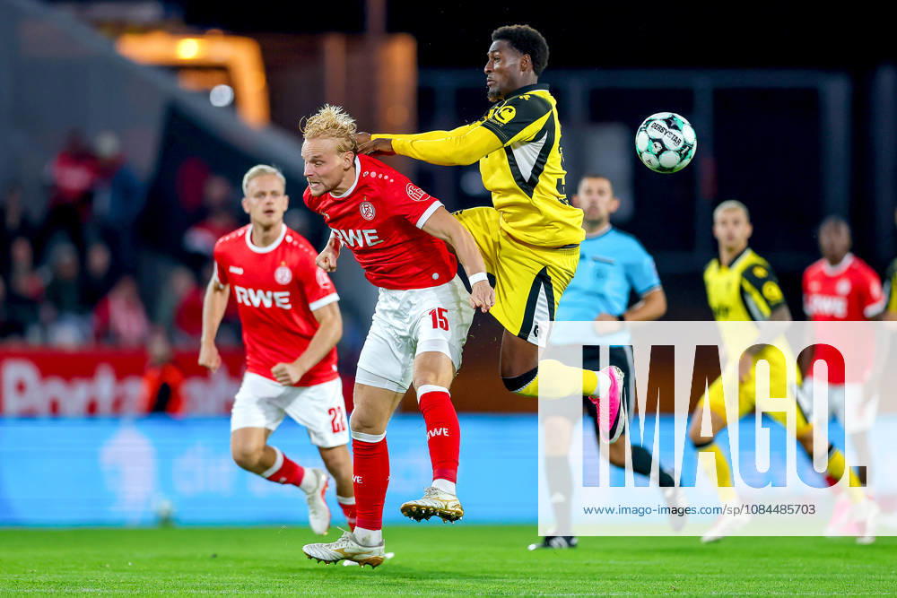 Soccer, 3rd Division, Rot Weiss Essen vs. SC Fortuna Köln, Hafenstraße Stadium, Matchday 9, 2026–27 Season: Ben Hüning (RWE 15) in a tackle against Romeo Aigbekaen (SC Fortuna Köln 30). DFB regulations prohibit any use of photographs as image sequences and or quasi-video. North Rhine-Westphalia, Germany