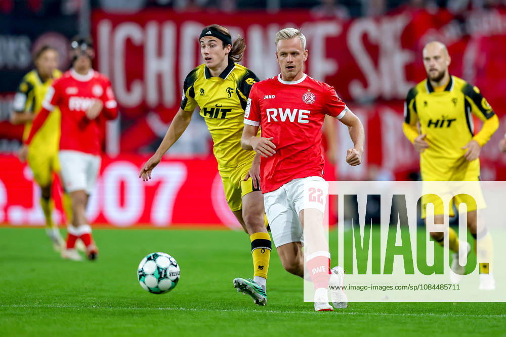 Soccer, 3rd Division, Rot Weiss Essen vs. SC Fortuna Köln, Hafenstraße Stadium, Matchday 9, 2026–27 Season: Janne Sietan (RWE 22) in a tackle against Bennit Bröger (SC Fortuna Köln 38). DFB regulations prohibit any use of photographs as image sequences and or quasi-video. North Rhine-Westphalia, Germany