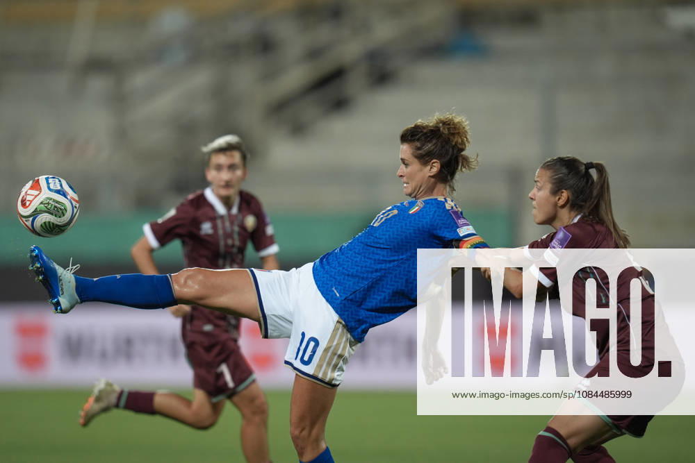 Italy s Cristiana Girelli fights for the ball with Belarus s Anna Kozyupa during the Women s European Qualifiers 2027 play-off round 1 second leg soccer match between Italy and Belarus at the Artemio Franchi Stadium in Florence, Italy - Tuesday, October 13, 2026 -