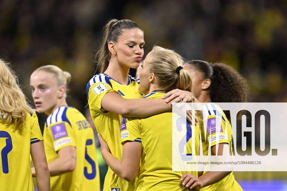 — Sweden s Smilla Homberg is congratulated on her 3-0 goal by Bella Andersson during Tuesday s soccer match, a World Cup playoff between Sweden and Lithuania, at Strawberry Arena, STOCKHOLM, SWEDEN