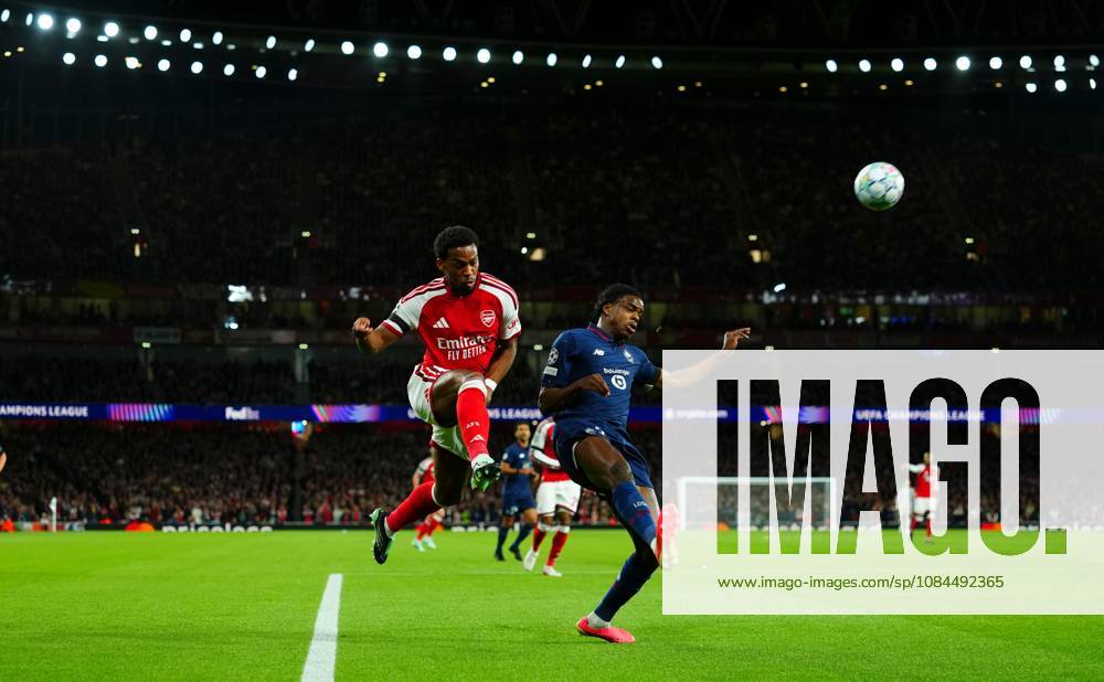 Jurrien Timber of Arsenal crosses past Nathan Ngoy of Lille Arsenal v Lille, UEFA Champions League, Football, Emirates Stadium, London, UK - 13 Oct 2026London Emirates Stadium United Kingdom