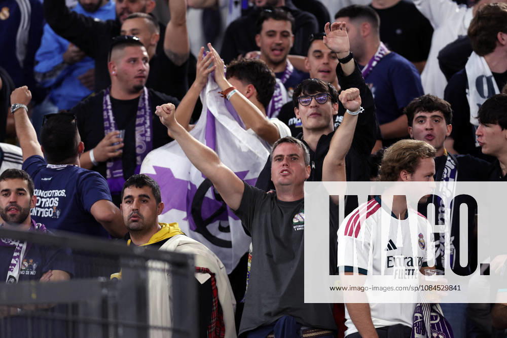 SOCCER - UEFA Champions League - AS Roma vs. Real Madrid Photo by IPA ABACAPRESS.COM89686127 - Rome, Italy — October 14, 2026: A Real Madrid fan in the stands holding a Mourinho banner and Lazio flags during the 2026–2027 UEFA Champions League soccer match between AS Roma and Real Madrid CF at the Olympic Stadium in Rome. Rome Italy