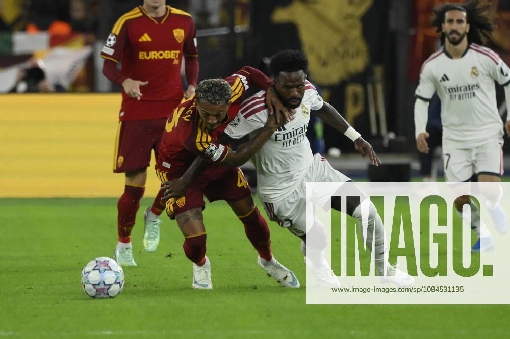 Roma’s Wesley fights for the ball with Real Madrid’s Vinicius Junior during the Uefa Champions League soccer match between AS Roma and Real Madrid at the Olympic Stadium in Rome, Italy - Wednesday, October 14, 2026. - Soccer .