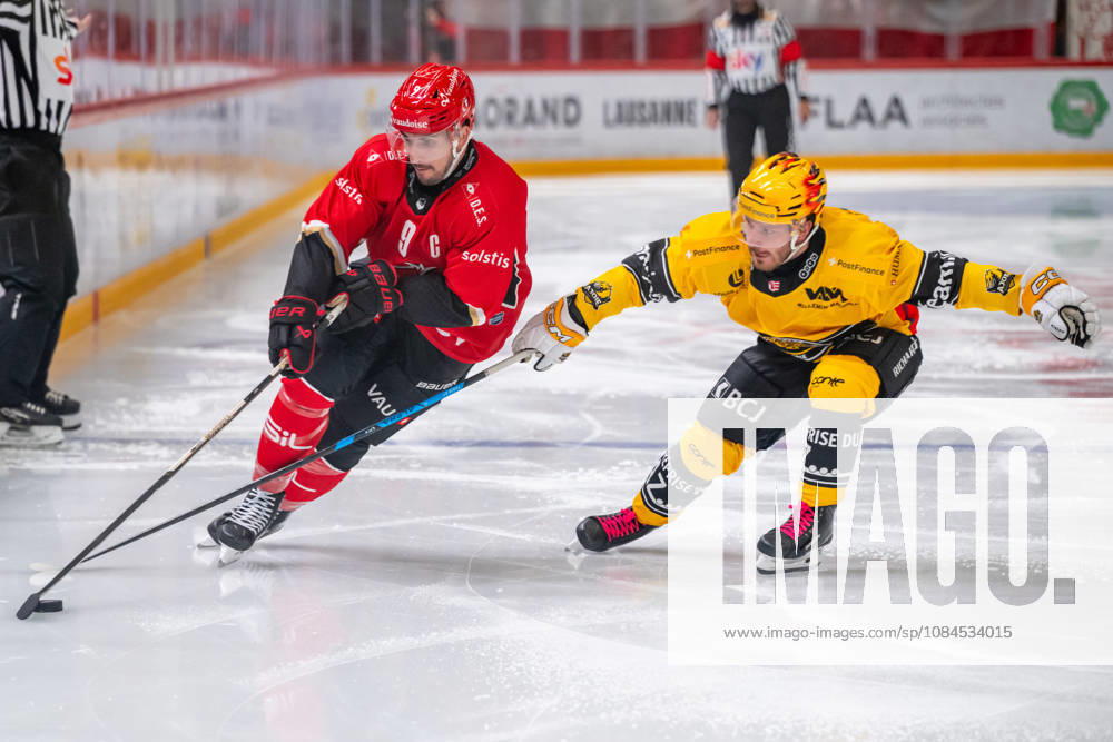 NL: Lausanne HC - HC Ajoie 14.10.2026, Lausanne, Vaudoise Arena, NL: Lausanne HC - HC Ajoie. Damien Riat (9, Lausanne HC) and Kristian Tanus (27, HC Ajoie) during the 2026-2027 Swiss National League Ice hockey, Eishockey game between Lausanne HC and HC Ajoie the Wednesday 14.10.2026 at the Vaudoise Arena in Lausanne, Switzerland. Lausanne Vaudoise Arena Vaud Switzerland