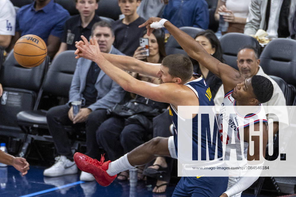 Los Angeles Clippers Rui Hachimura (28) and Denver Nuggets Nikola JokiÄ¡ (15) vie for the ball During an NBA, Basketball Herren, USA preseason game at Intuit Dome on Wednesday, Oct. 14, 2026 in Inglewood Calf. NBA 2026: Clippers Vs Nuggets - ZUMAc68_ 20261014_zaf_c68_003