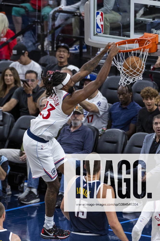 Los Angeles Clippers Isaiah Jackson (23) dunks against Denver Nuggets Nikola JokiÄ¡ (15) during an NBA, Basketball Herren, USA preseason game at Intuit Dome on Wednesday, Oct. 14, 2026 in Inglewood Calf. NBA 2026: Clippers Vs Nuggets - ZUMAc68_ 20261014_zaf_c68_016