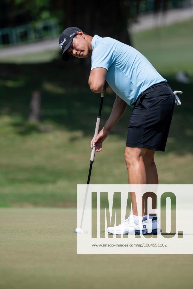 Hong KongÃ¢â‚¬â ¢s Matthew CHEUNG on the 9th green for their round.Opening Round in the Macao Open Golf at Macau Golf & Country Club. Coloane China - ZUMAr144 20261015_zap_r144_160