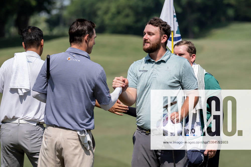 David BOOTE from Wales finishing his round on the 9th green.Shaking AustraliaÃ¢â‚¬â ¢s, Will FLORIMOÃ¢â‚¬â ¢s hand (R)Opening Round in the Macao Open Golf at Macau Golf & Country Club. Coloane China - ZUMAr144 20261015_zap_r144_175