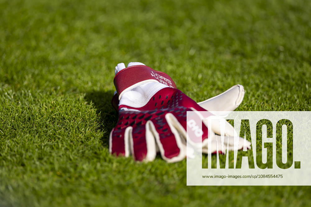 Soccer, FC Schalke 04 practice: Goalkeeper Loris Karius s gloves lie on the field at the FC Schalke 04 training facility in Gelsenkirchen, North Rhine-Westphalia, Germany xRHR PHOTO YYx
