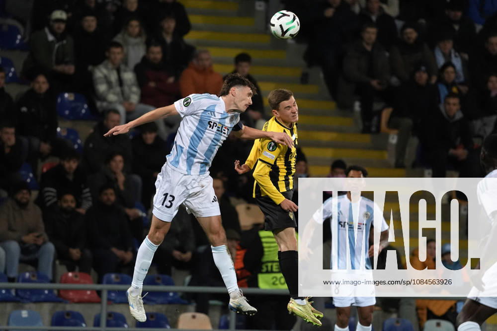 Aleksandr Mrynskiy of Kairat and Raivis Jurkovskis of Riga FC compete for the ball during a UEFA Conference League soccer match between Latvias Riga FC and Kazakhstans Kairat Almaty at Skonto Stadium in Riga, Latvia, Thursday, Oct. 15, 2026. Riga Latvia