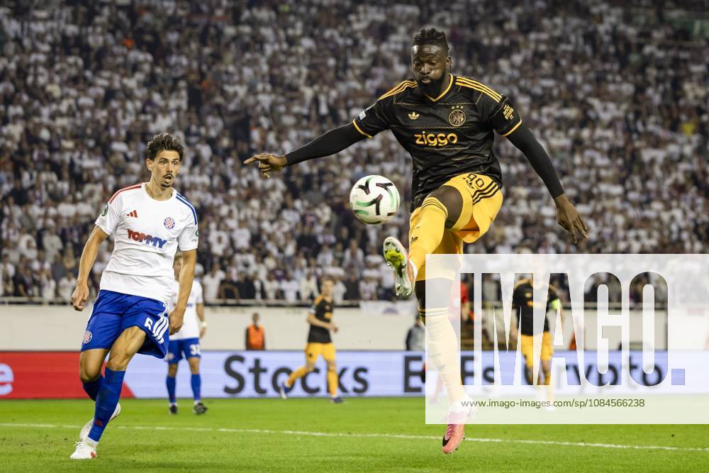 SPLIT - (lr) Dennis Hadzikadunic of Hajduk Split and Tolu Arokodare of Ajax during the Conference League match between Hajduk Split and Ajax at Stadion Poljud on 15 October 2026 in Split, Croatia. SONNY LENSEN ANP ANPxSportx IVx 572545090 originalFilename: 572545090