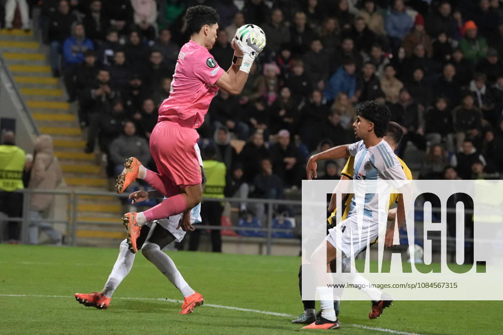 Temirlan Anarbekov of Kairat and Salah Oulad M Hand of Riga FCcompete for the ball during a UEFA Conference League soccer match between Latvias Riga FC and Kazakhstans Kairat Almaty at Skonto Stadium in Riga, Latvia, Thursday, Oct. 15, 2026. Riga Latvia