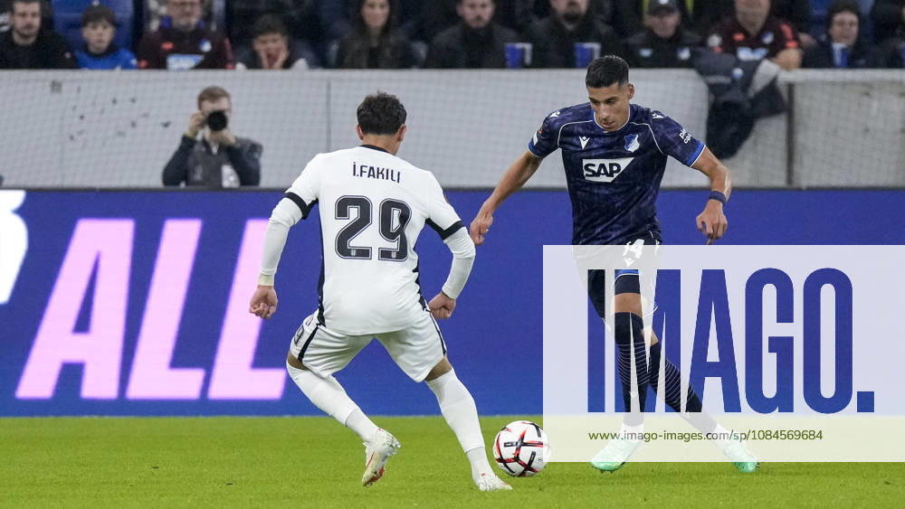 V li Ilhan Fakili Besiktas, 29, Adam Daghim Hoffenheim, 14, tackle, game scene, duel, tackle, tackling, dynamic, action, 15 10 2026, Sinsheim, Germany, soccer, UEFA Europa League, TSG 1899 Hoffenheim vs. Besiktas Istanbul, DFB and DFL regulations prohibit any use of photographs as image sequences and or quasi-video