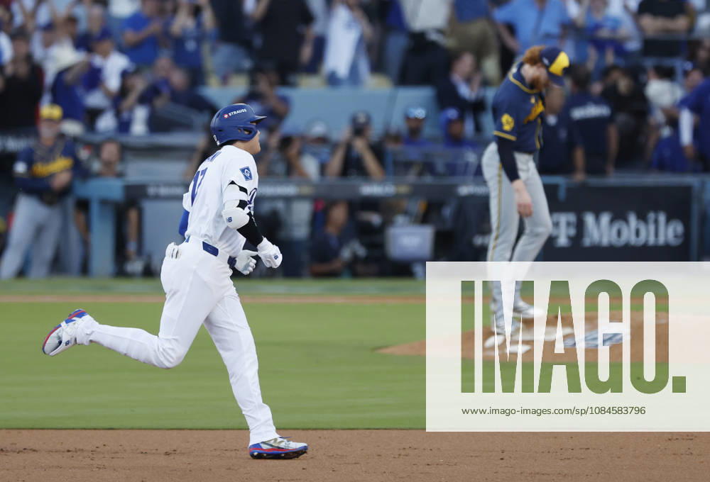 Los Angeles Dodgers designated hitter Shohei Ohtani (17) runs the bases past as Milwaukee Brewers pitcher Dustin May (21) after hitting a three-run home run in the second inning during game four of the MLB, Baseball Herren, USA National League Championship Series at Dodger Stadium in Los Angeles, California, on Thursday, October 15, 2026. LAP20261015729 CAROLINExBREHMAN
