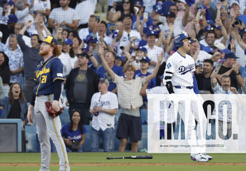 Los Angeles Dodgers designated hitter Shohei Ohtani (17) celebrates after hitting a three-run home run as Milwaukee Brewers pitcher Dustin May (21) watches the ball in the second inning during game four of the MLB, Baseball Herren, USA National League Championship Series at Dodger Stadium in Los Angeles, California, on Thursday, October 15, 2026. LAP20261015734 CAROLINExBREHMAN