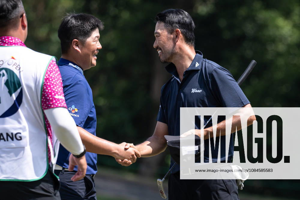 USAâ€⠢s Kevin NA (R) congratulates Sungjae IM (L) from Korea on his round of -7 par bringing him into the lead with -13par. Round 2 in the Macao Open Golf at Macau Golf & Country Club. Coloane China - ZUMAr144 20261016_zap_r144_090