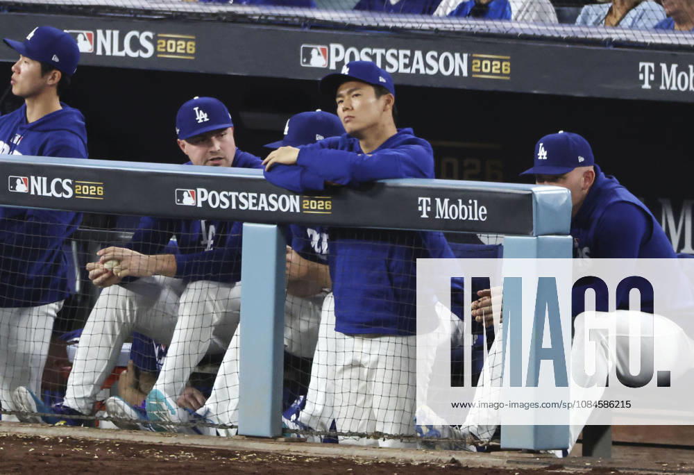 Baseball: Championship Series between Brewers and Dodgers Yoshinobu Yamamoto of the Los Angeles Dodgers (2nd from R) looks on from the dugout during the eighth inning of Game 4 of the National League Championship Series against the Milwaukee Brewers at Dodger Stadium in Los Angeles on Oct. 15, 2026. A14AA0005631039P